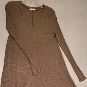 This item is a lightweight knit dress by Lush. The size is Lg.